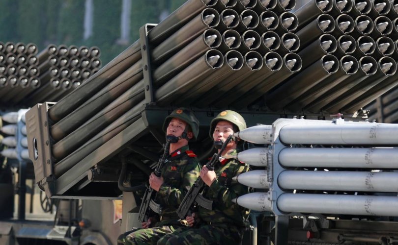 Soldiers ride a multiple rocket launcher during a military parade marking the 70th anniversary of North Korea's foundation in Pyongyang