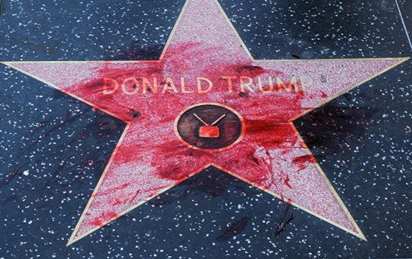 Трампын алдрын одыг хуурамч цусаар буджээ