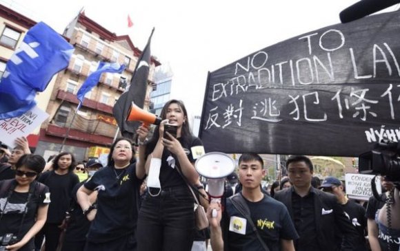 АНУ-ын их сургуулиудад Хонгконгийг дэмжиж жагсав