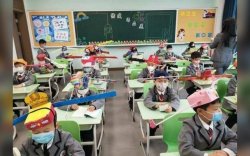 Хятад хүүхдүүд “зай баригч малгай” өмсөн хичээллэж байна