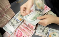 Хятадын Ардын банк юанийн ам.доллартай харьцах ханшаа өсгөв