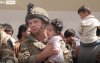 46842525-9906315-A_British_paratrooper_is_seen_holding_a_crying_Afghan_child_as_t-a-70_1629337817622