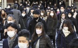 Япон: Covid-19-ийн статусыг томуугийн зэрэгт буулгана
