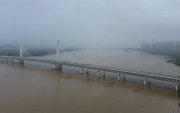Хятад: 12 цаг үргэлжлэх борооноос урьтаж иргэдээ нүүлгэв