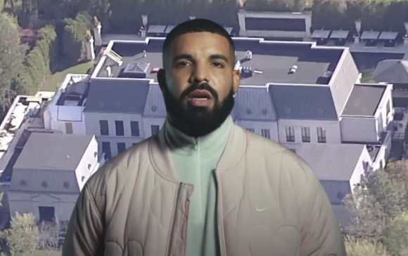 Реппер Drake-ийн гэрт бие хамгаалагч нь буудуулсан байжээ